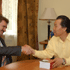 Shaking hands with Mikhail Sirota, leader of the Trudovaya Party, who came to meet with Rev. C.S. Lee at our lodge